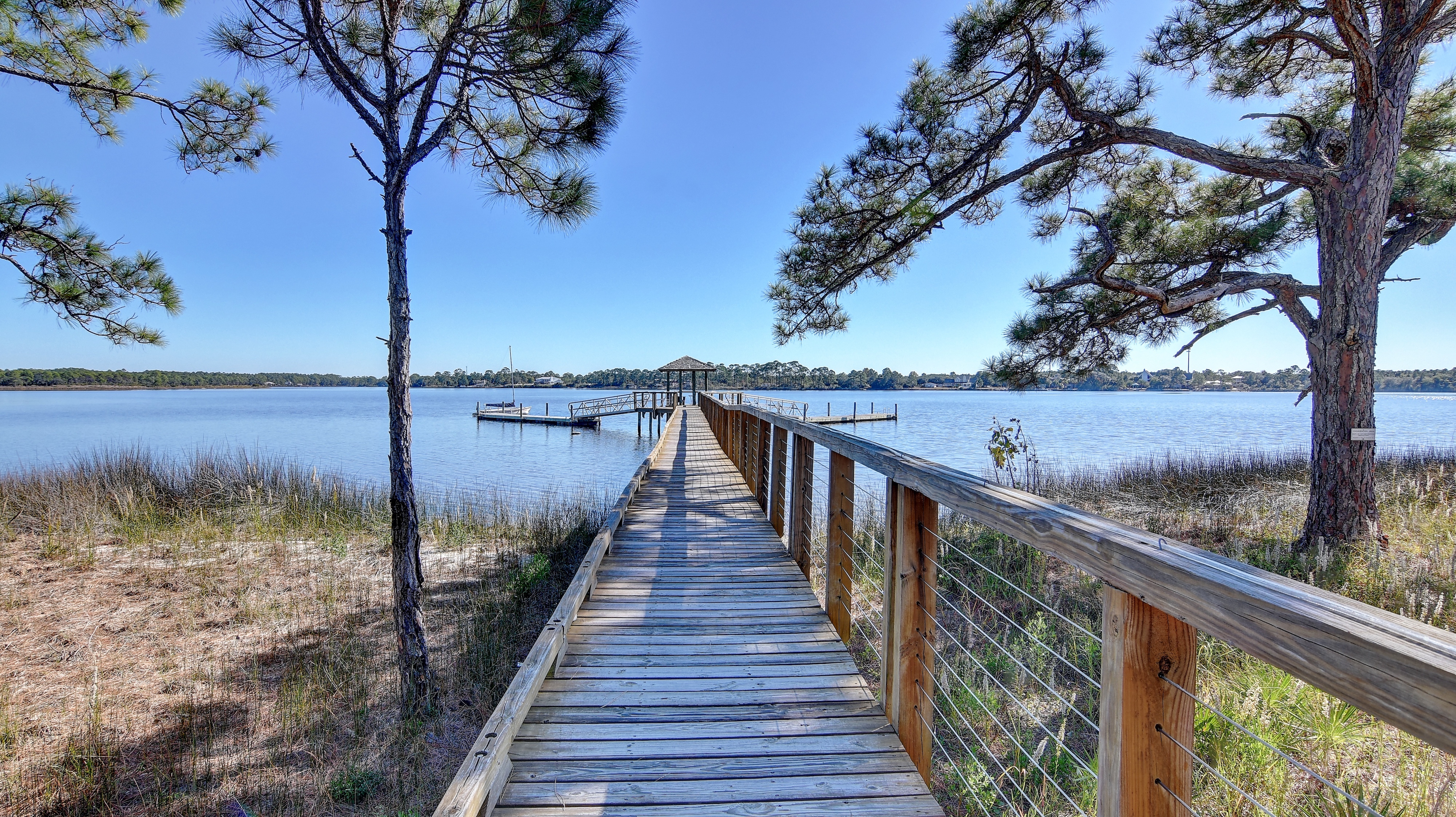 A view of the boardwalk out to the lake at Wild Heron
